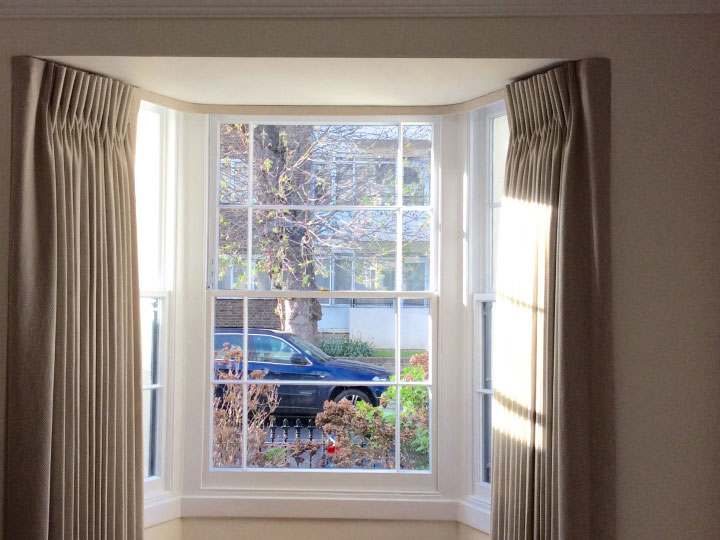 Double pleat bay window curtains with lath & fascia
