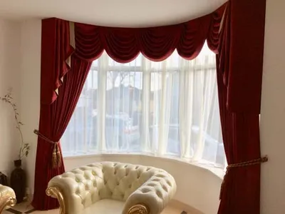 Curtain with decorative swag and tails