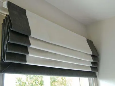 Waterfall roman blind in a bright room