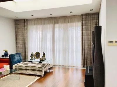 Lined double pleat curtain including metal pole fitted sheer curtain