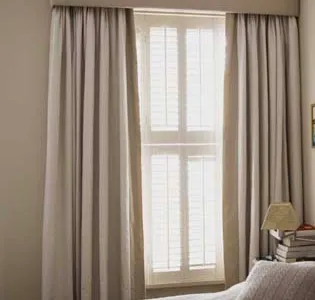 Pencil pleat lined curtains including pelmet