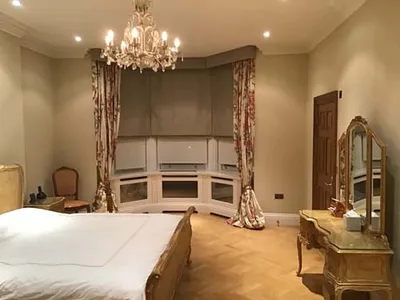 Lined and interlined hand stitched roman blind including pelmet and drape