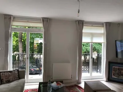 Lined double pleat curtain with track